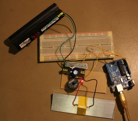 The regulator set up with a power resistor and Arduino to check the battery shuts off properly.