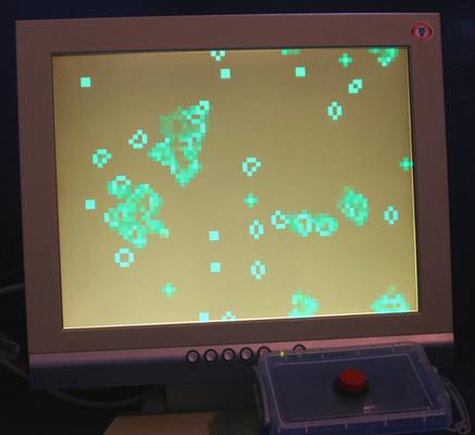 A photo of the game being played out on a monitor.