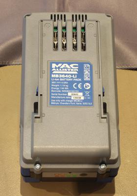 Outside of the battery pack, showing the ratings label.